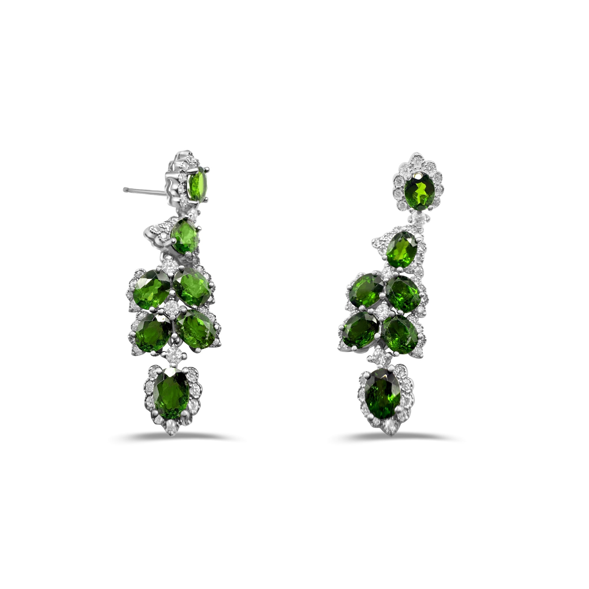 Pair of green gemstone earrings on a white background